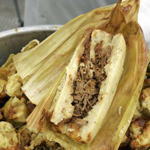Single Beef Tamale. Opened to see meat inside tamale